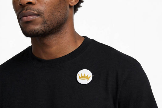 KASH CROWN pin button set — detail photo of the black and gold crown pins