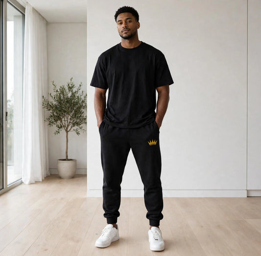 KASH CROWN Signature Sweatpants — close-up of the gold crown embroidery on the leg